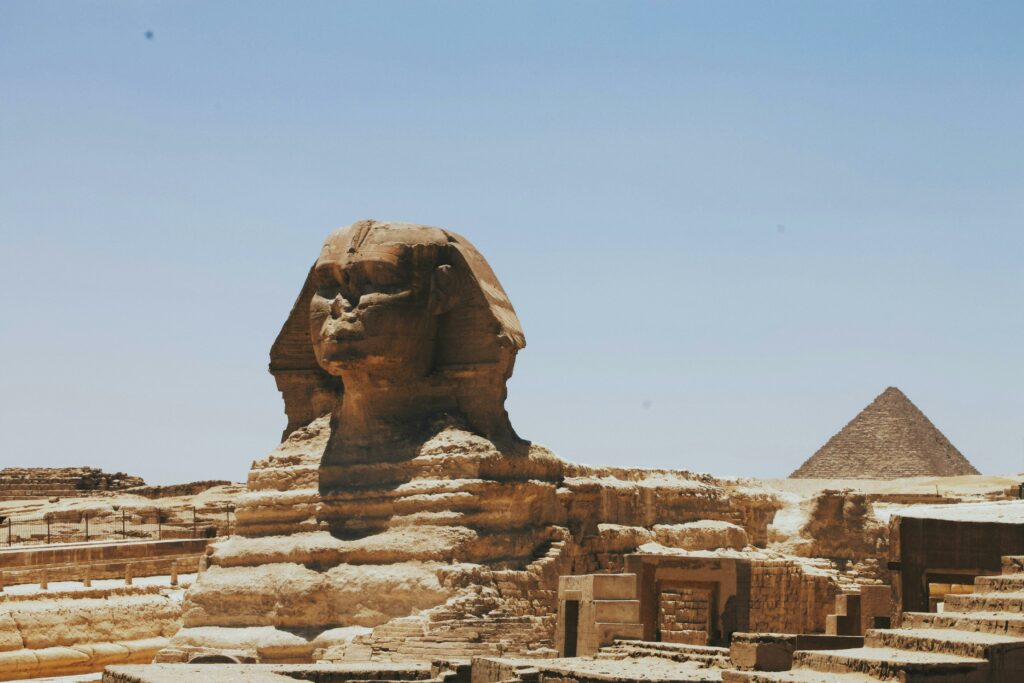 pexels photo 2402926 2402926 View of the Great Sphinx of Giza and Pyramid, iconic Egyptian landmarks in daylight.